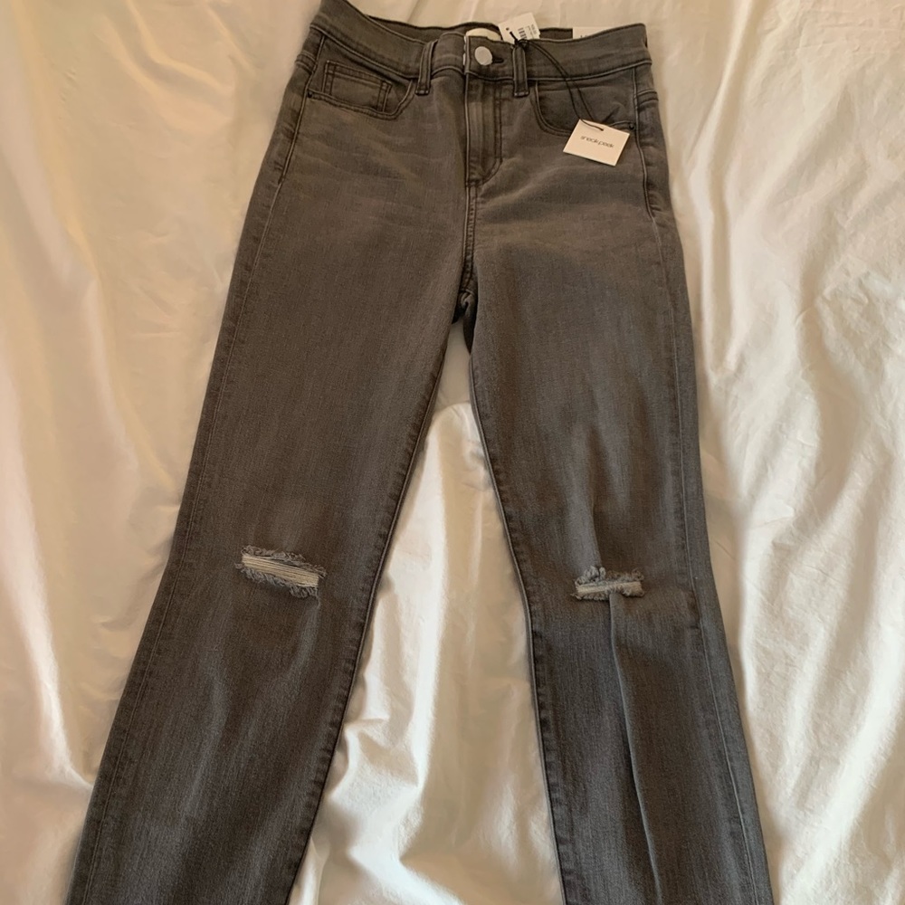 Grey high rise distressed skinny jean